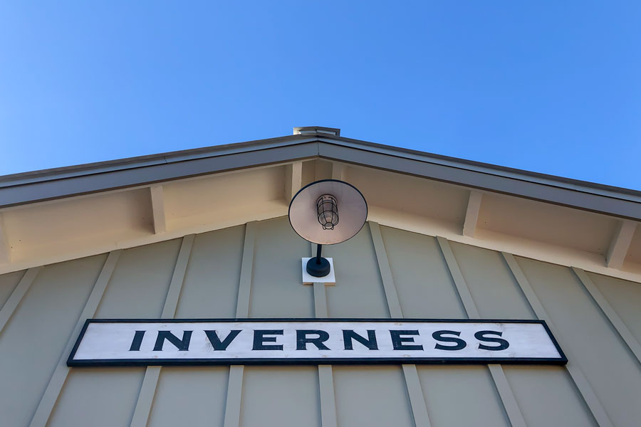 Downtown Inverness sign on a historic-style building