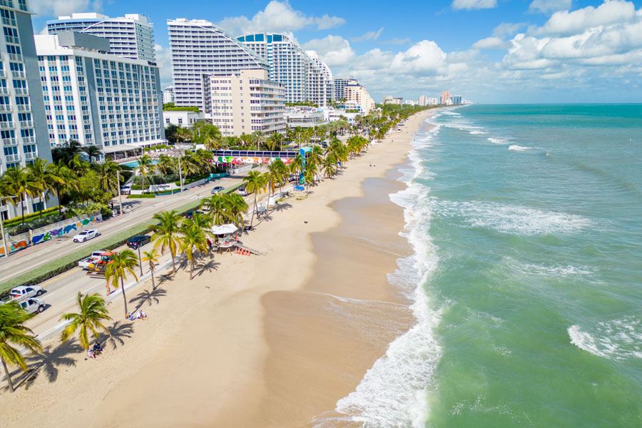 Fort Lauderdale Beach highlights one of South Florida’s classic coastal scenes, with high-rise hotels, palm-lined streets, sandy shoreline, and Atlantic Ocean views. The area is popular for beach vacations, walking, dining, boating, and exploring Broward County’s waterfront communities.