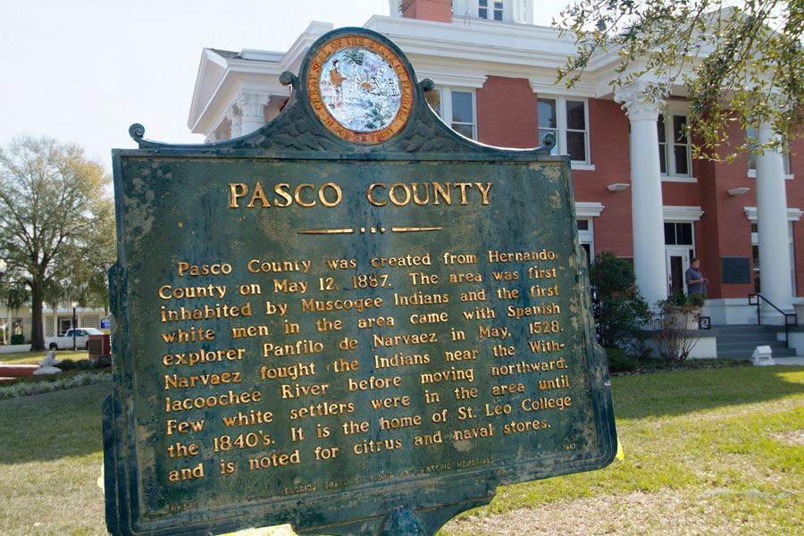 A Florida Historical Marker outside the Pasco County Historic Courthouse highlights the county's early history and heritage in downtown Dade City, Florida. The courthouse grounds serve as a focal point for visitors exploring the city's historic district, government center, and many preserved landmarks dating back to the late 19th and early 20th centuries.