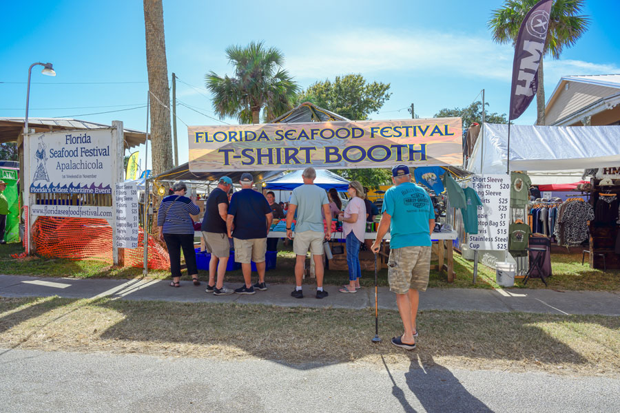 Visitors gather at the Florida Seafood Festival in Apalachicola, a long-running celebration of the region’s seafood industry, maritime heritage and coastal community. Held along the historic waterfront, the annual festival reflects the close connection between Apalachicola Bay and the fishing traditions of Florida’s Panhandle.
