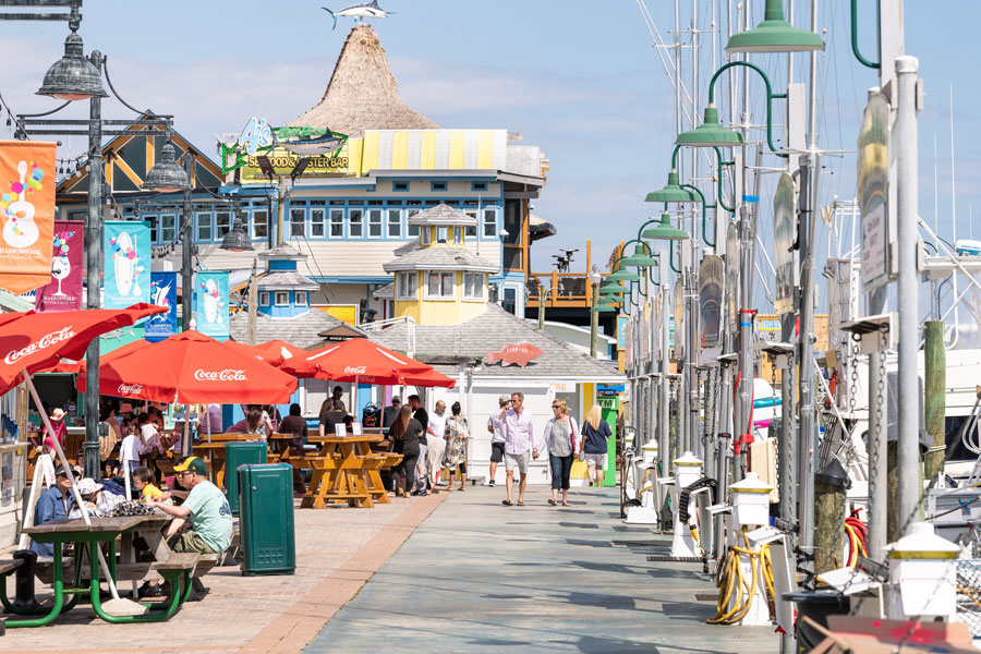 HarborWalk Village in Destin combines a working marina with waterfront restaurants, shops and entertainment along Destin Harbor. Visitors can watch charter and recreational boats come and go while enjoying dining, sightseeing and easy access to many of the boating and fishing activities that help define the Emerald Coast. Photo credit: Andriy Blokhin; licensed.